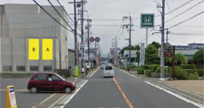 宇治徳洲会病院横の屋外看板広告です。問い合わせ番号はKY009です。
